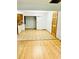 Spacious living area with tile flooring, seamlessly transitioning to the hardwood floors at 3610 Sw 25Th Pl, Ocala, FL 34474