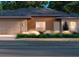 Modern single-story home with neutral siding, attached two-car garage, and well-manicured landscaping at 4105 Sw 130Th Pl, Ocala, FL 34473