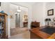 Hallway with wood furniture and neutral paint, leading to other rooms in the home at 4232 Nw 56Th Ct, Ocala, FL 34482