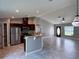 Modern kitchen with stainless steel appliances and granite countertops at 5320 Sw 128Th Pl, Ocala, FL 34473