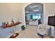 Elegant foyer with decorative accents that flows into the spacious living area at 5845 Sw 43Rd Street Rd, Ocala, FL 34474