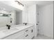 Modern bathroom featuring a double vanity, marble floors, and sleek fixtures at 6240 Cherry Rd, Ocala, FL 34472