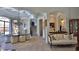 Beautiful dining room boasting a modern chandelier, seating for six, and hardwood stairs at 695 Se 47Th Loop, Ocala, FL 34480
