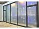Spacious wine cellar with glass doors and temperature controls, perfect for wine connoisseurs and collectors at 695 Se 47Th Loop, Ocala, FL 34480