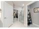 Bathroom with a glass shower enclosure, walk-in closet, and neutral decor at 7839 Sw 97Th Cir, Ocala, FL 34481