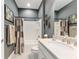 Full bathroom featuring granite countertops, updated fixtures, and a tub with a shower at 7839 Sw 97Th Cir, Ocala, FL 34481
