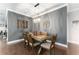 Elegant dining room showcasing stylish decor, modern lighting, and comfortable seating for six at 7839 Sw 97Th Cir, Ocala, FL 34481