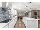 Spacious kitchen with an island overlooking the living area, ideal for entertaining at 7839 Sw 97Th Cir, Ocala, FL 34481