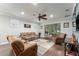 Comfortable living room with plush seating and seamless access to the outdoor patio at 7839 Sw 97Th Cir, Ocala, FL 34481