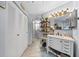 Bathroom with a vanity and sink and a connecting toilet room at 7961 Midway Drive Ter # J102, Ocala, FL 34472