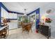 Bright eat-in kitchen with ample cabinet space and sliding doors, perfect for Gathering meals and gatherings at 7961 Midway Drive Ter # J102, Ocala, FL 34472
