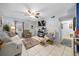 Cozy living room with tile flooring and natural light creates a welcoming atmosphere to relax in at 7961 Midway Drive Ter # J102, Ocala, FL 34472