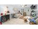 Bright living room with a ceiling fan, tile flooring, and comfortable seating is perfect for relaxation at 7961 Midway Drive Ter # J102, Ocala, FL 34472