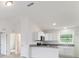 Bright kitchen with white cabinets, modern appliances, and an open design, perfect for cooking at 87 Redwood Rd, Ocala, FL 34472