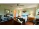 Inviting bedroom with a cozy bed, ambient lighting, and stylish decor for relaxation and rest at 9490 Sw 94Th Ct, Ocala, FL 34481