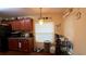 Kitchen featuring ample cabinet space and a window for natural light at 9490 Sw 94Th Ct, Ocala, FL 34481