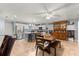 Bright kitchen featuring stainless steel appliances, tile flooring, and a center island with bar seating at 9587 Sw 84Th Ter # E, Ocala, FL 34481