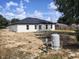 A expansive backyard showing the blank canvas for a future outdoor living space at 9721 Bahia Rd, Ocala, FL 34472