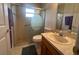 Cozy bathroom with a clear glass door shower, neutral finishes, and tiled flooring at 9730 Sw 90Th St, Ocala, FL 34481