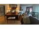 Spacious living room featuring wood floors and an open layout at 9730 Sw 90Th St, Ocala, FL 34481