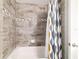 The renovated bathroom offers contemporary fixtures and tiled shower at 9957 Sw 45Th Ave, Ocala, FL 34476