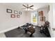 Bright exercise room with rowing machine and free weights at 9957 Sw 45Th Ave, Ocala, FL 34476