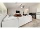 Comfortable living room with a plush sofa, large windows, and an open design concept for easy living at 9957 Sw 45Th Ave, Ocala, FL 34476