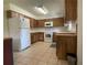 Kitchen featuring updated appliances, new countertops, and wood cabinetry at 145 Ne 71St Ave, Ocala, FL 34470