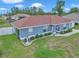Charming single-story home with a well-maintained lawn and inviting curb appeal, featuring white-framed windows and nice shrubbery at 14762 Sw 22Nd Court Rd, Ocala, FL 34473