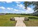 A brick paver patio with seating area in a large fenced lot at 15360 Se 73Rd Avenue, Summerfield, FL 34491