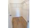 This closet features wood-look flooring and a wire shelf for optimal storage at 1686 Sw 168Th Loop, Ocala, FL 34473
