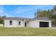 Beautiful single-story home featuring a sleek design and a spacious two-car garage at 1686 Sw 168Th Loop, Ocala, FL 34473
