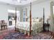 This spacious primary bedroom is conveniently located off the kitchen and living areas at 1953 Hartford Path, The Villages, FL 32162