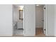 Bright bathroom with tile flooring and updated white vanity with gold hardware at 21191 Sw Plantation St, Dunnellon, FL 34431