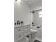 Bright bathroom featuring a tub with shower and a vanity with marble countertops at 21191 Sw Plantation St, Dunnellon, FL 34431