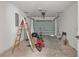 Spacious garage interior with tools and room for parking at 21191 Sw Plantation St, Dunnellon, FL 34431