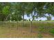 Pastoral land with a wire fence at 21191 Sw Plantation St, Dunnellon, FL 34431