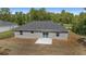 Aerial view of backyard, with sliding glass doors and patio at 2297 Sw 143 Ct, Ocala, FL 34481