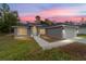 This charming single-story home has simple landscaping at 2297 Sw 143 Ct, Ocala, FL 34481