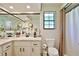 Bathroom with vanity, mirror and wood plank walls at 2855 Se 38Th St, Ocala, FL 34480