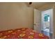Small bedroom with doorway to bathroom at 2855 Se 38Th St, Ocala, FL 34480