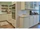 Modern kitchen featuring sleek cabinets, stainless steel appliances, and countertops at 2855 Se 38Th St, Ocala, FL 34480