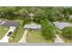 Aerial view showcasing the home's location with a well-manicured lawn at 329 Larch Rd, Ocala, FL 34480