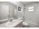 Traditional bathroom with tiled tub/shower, vanity and medicine cabinet at 329 Larch Rd, Ocala, FL 34480
