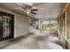 Screened patio with fan at 329 Larch Rd, Ocala, FL 34480