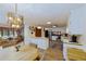 Bright kitchen with stainless steel appliances, wood countertops, laminate floors, and a dining nook at 3427 Se 137Th St, Summerfield, FL 34491