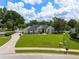 Charming home featuring well-manicured lawn and stone facade at 3883 Se 51St Ct, Ocala, FL 34480