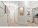 Hallway with tile floors and decorative niche; leads to bathroom and other rooms at 3883 Se 51St Ct, Ocala, FL 34480