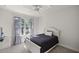 Cozy bedroom featuring neutral walls, lots of natural light, and a comfortable twin bed at 3993 Se 10Th Ave, Ocala, FL 34480