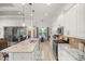 Modern kitchen featuring granite countertops and stainless steel appliances at 3993 Se 10Th Ave, Ocala, FL 34480
